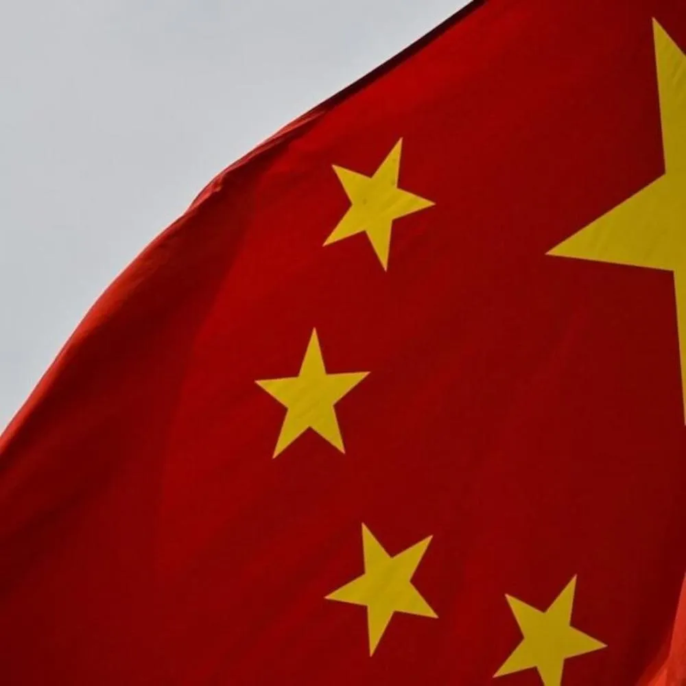 Bandeira da China - Foto: Hector Retamal / AFP