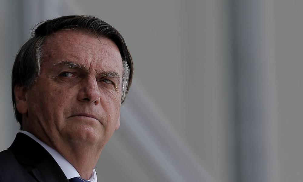O presidente Jair Bolsonaro acompanha cerimônia no Palácio do Planalto Foto: Cristiano Mariz / Agência O Globo/16-12-2021