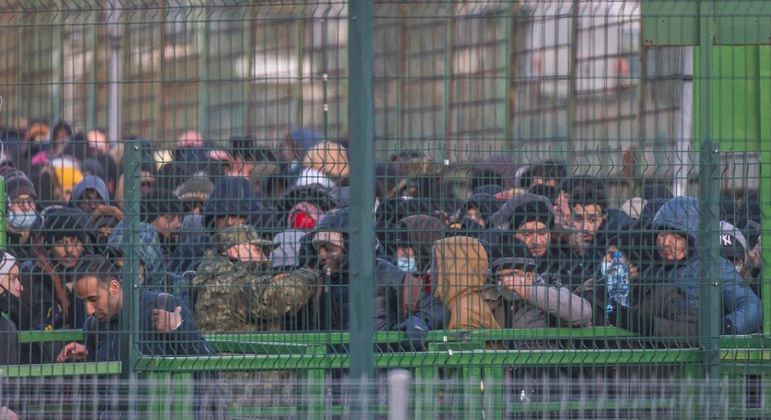 Refugiados da Ucrânia chegam à fronteira da Polônia WOJTEK RADWANSKI/AFP - 28.2.2022