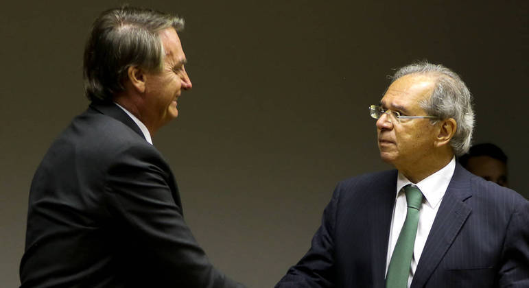 O presidente da República, Jair Bolsonaro, e o ministro da Economia, Paulo Guedes WILSON DIAS/AGÊNCIA BRASIL - 22.10.2021